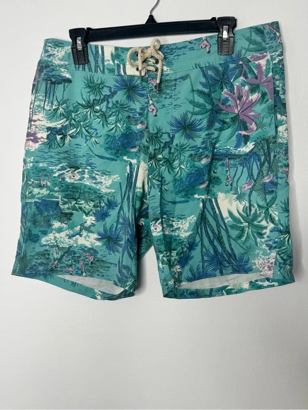 Faherty board shorts featuring a tropical print size 32